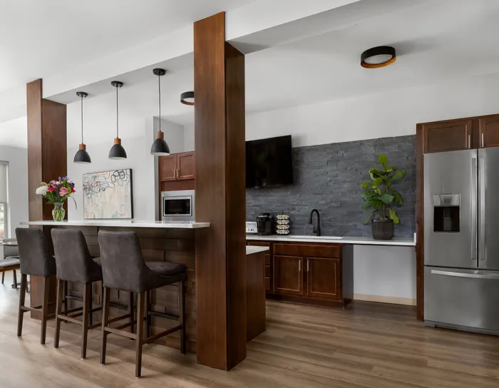 Clubroom at The Woodlands at North Hills offering comfortable seating and flexible community space.