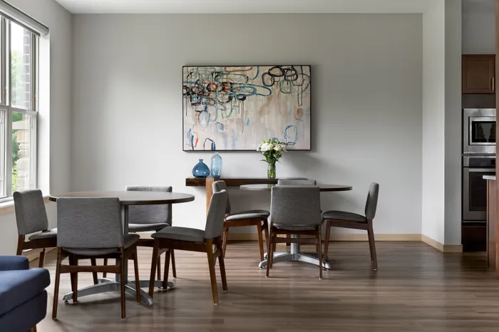 Clubroom at The Woodlands at North Hills offering comfortable seating and flexible community space.