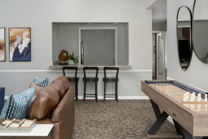 Clubroom at Manchester Oaks Apartments in Franklin, Wisconsin designed for social events and resident activities.