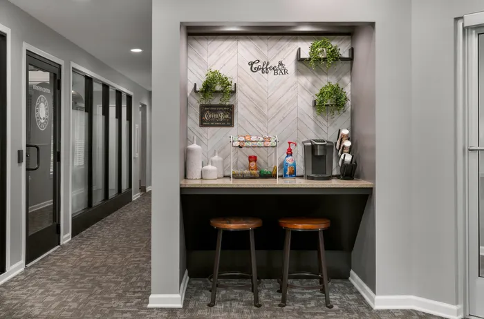 Complimentary coffee station at Manchester Oaks Apartments in Franklin, Wisconsin for resident convenience.