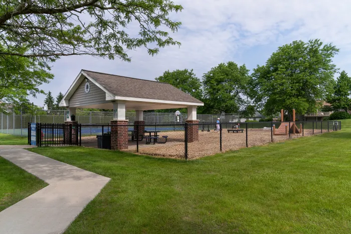 Dog park at Manchester Oaks Apartments in Franklin, Wisconsin for resident pets and recreation.