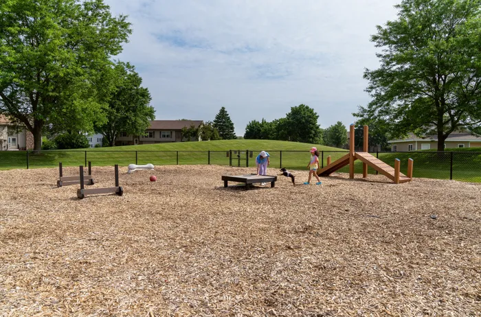 Dog park at Manchester Oaks Apartments in Franklin, Wisconsin for resident pets and recreation.