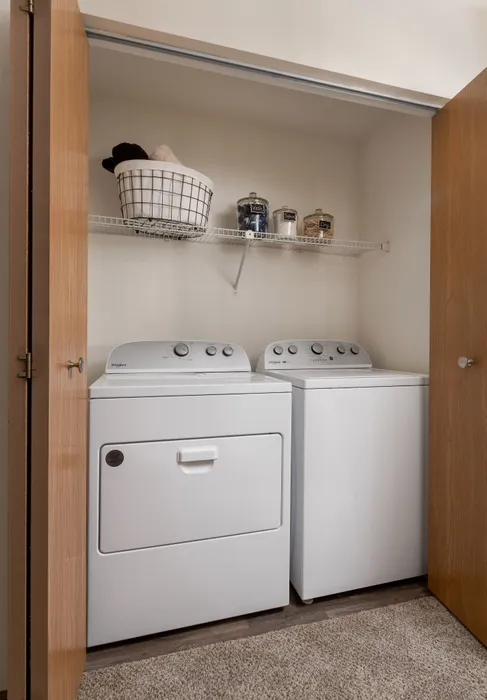 In-unit washer and dryer at Manchester Oaks Apartments in Franklin, Wisconsin providing convenience for residents.
