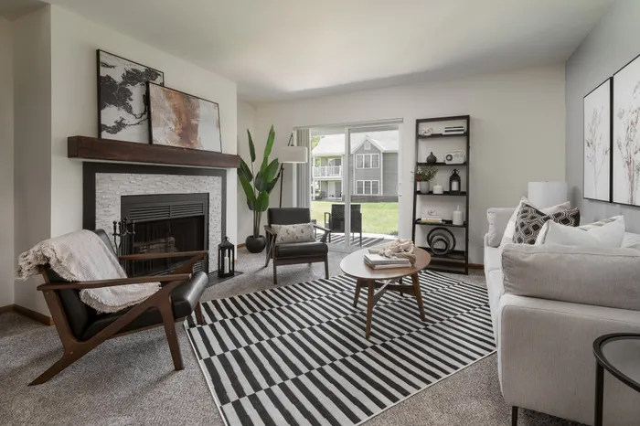Living room at Manchester Oaks Apartments in Franklin, Wisconsin with spacious layouts and natural light.