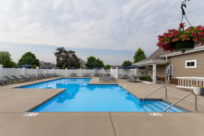 Heated outdoor pool at Manchester Oaks Apartments in Franklin, Wisconsin for resident recreation and relaxation.