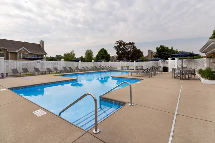 Heated outdoor pool at Manchester Oaks Apartments in Franklin, Wisconsin for resident recreation and relaxation.