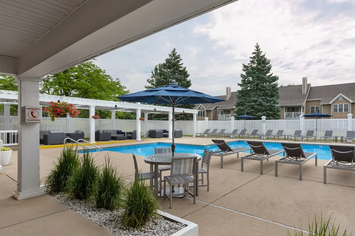 Heated outdoor pool at Manchester Oaks Apartments in Franklin, Wisconsin for resident recreation and relaxation.