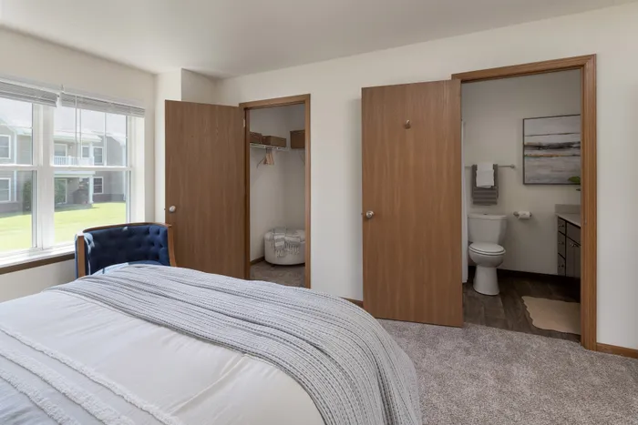 Primary bedroom at Manchester Oaks Apartments in Franklin, Wisconsin offering spacious and comfortable living.