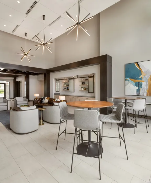 Clubhouse at Seasons at Grafton Apartments in Grafton, Wisconsin featuring shared spaces for residents to gather and relax.
