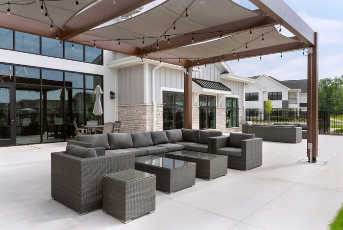 Patio space at Seasons at Grafton Apartments in Grafton, Wisconsin extending the living area outdoors.