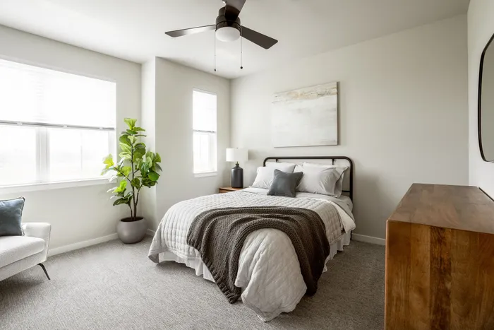 Modern townhome bedroom with contemporary finishes at Apex at Verona in Verona, WI.