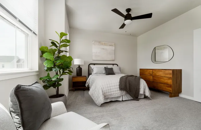Modern townhome bedroom with contemporary finishes at Apex at Verona in Verona, WI.