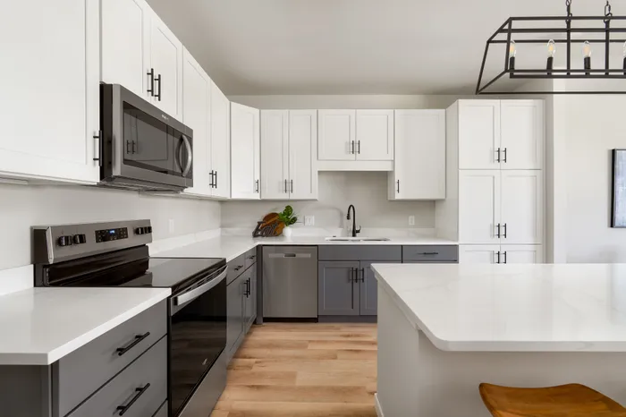 Modern townhome kitchen with contemporary finishes at Apex at Verona in Verona, WI.
