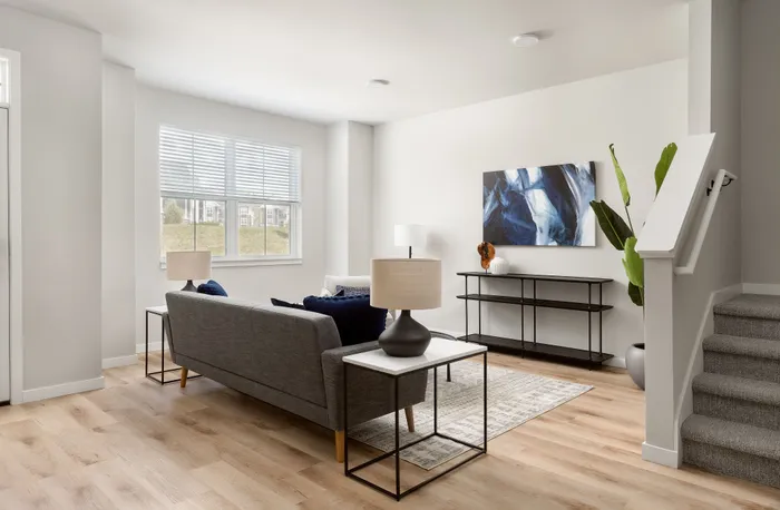 Spacious townhome living area with modern finishes at Apex at Verona in Verona, WI.