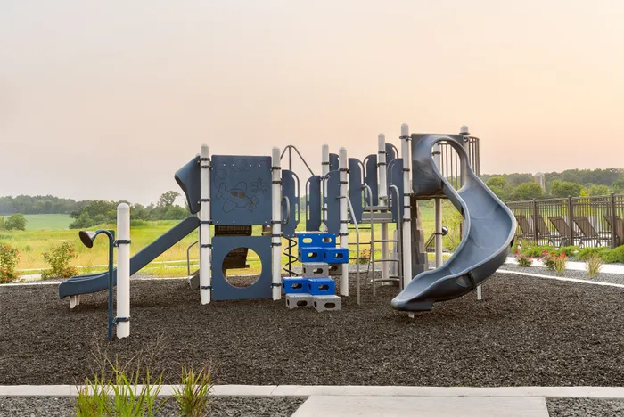 Community playground at Apex at Verona designed for outdoor recreation in Verona, WI.