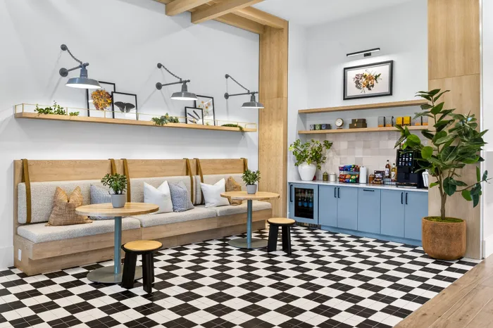 Café-style seating and coffee lounge space available for residents at Echelon at Charlotte Apartments in Charlotte, North Carolina.