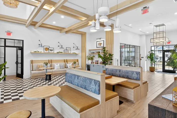Clubhouse interior with lounge seating and shared spaces at Echelon at Charlotte