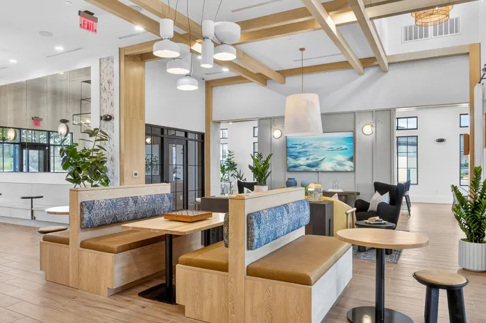 Clubhouse interior with lounge seating and shared spaces at Echelon at Charlotte