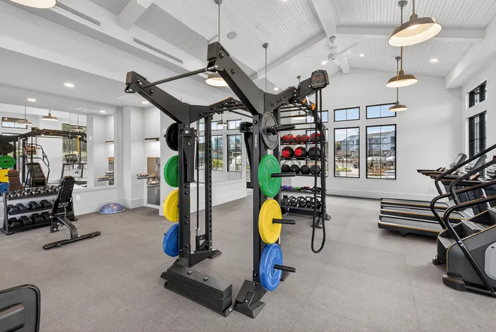 Apartment fitness center with modern workout equipment at Echelon at Charlotte in Charlotte, North Carolina.