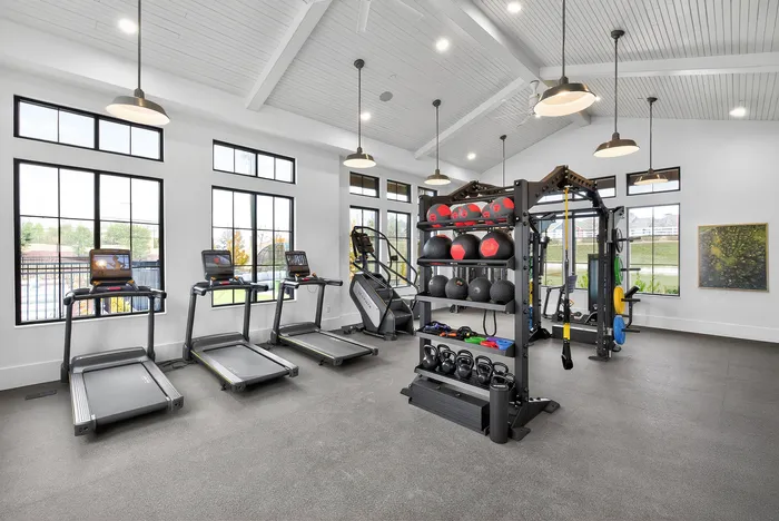 Apartment fitness center with modern workout equipment at Echelon at Charlotte in Charlotte, North Carolina.
