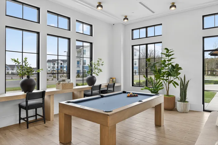 Game room with entertainment and seating at Echelon at Charlotte