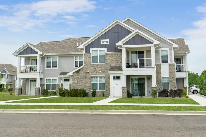 Apartment building exterior at Seasons at Plainfield Apartments in Plainfield, Illinois.