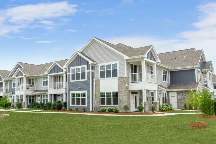 Apartment building exterior at Seasons at Plainfield Apartments in Plainfield, Illinois.