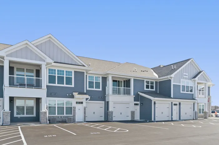 Apartment building exterior at Seasons at Plainfield Apartments in Plainfield, Illinois.