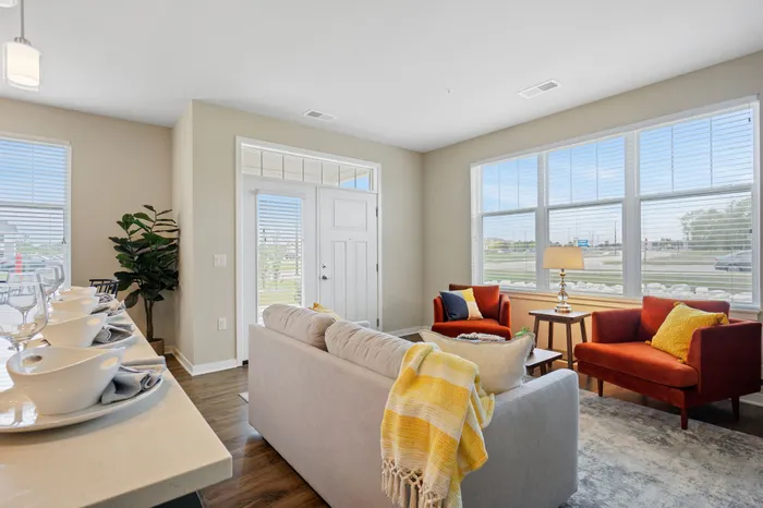 Apartment living room interior at Seasons at Plainfield Apartments in Plainfield, Illinois.