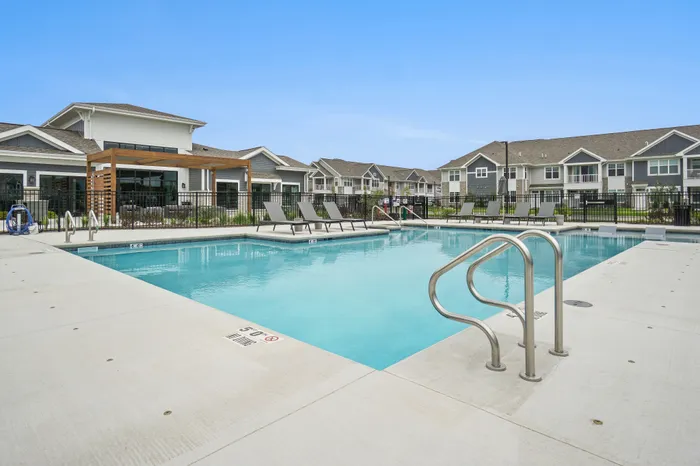 Resort-style apartment pool at Seasons at Plainfield Apartments in Plainfield, Illinois.