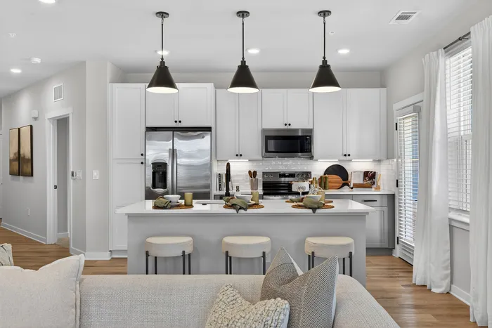 Modern kitchen at Echelon at Charlotte with stainless steel appliances and open layout