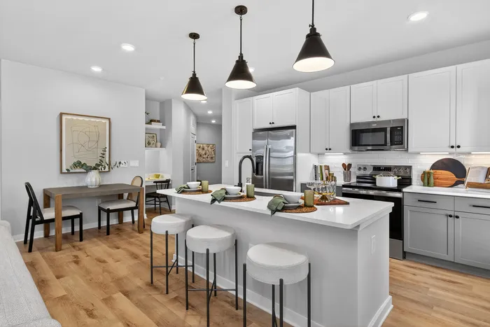 Modern kitchen at Echelon at Charlotte with stainless steel appliances and open layout
