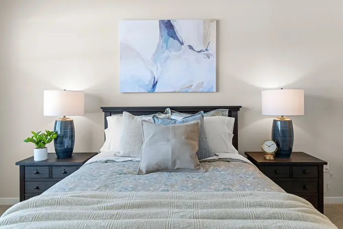 Bedroom with natural light and comfortable space at Seasons at Spring Street