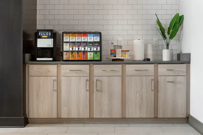 Complimentary coffee station with beverage area at Seasons at Spring Street