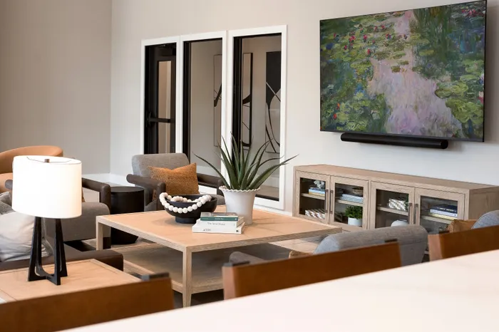 Modern clubhouse interior and resident lounge at Terrapin Run apartments.