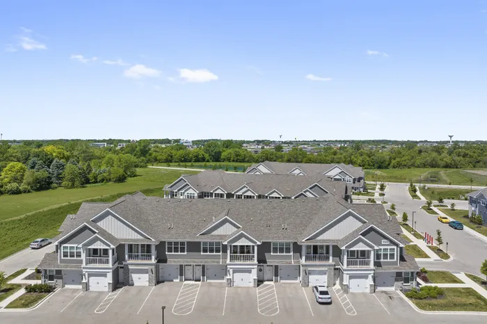 Resident building exterior at Seasons at River View Apartments in Pleasant Prairie, Wisconsin.