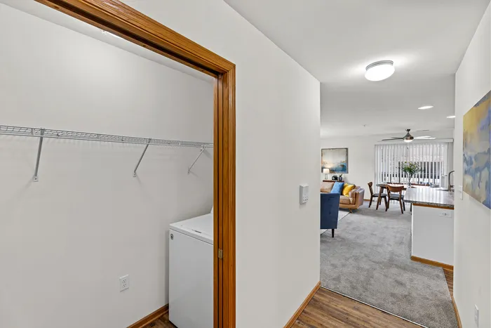 Full size washer and dryer at Saddlebrook Apartments in Pewaukee, Wisconsin.