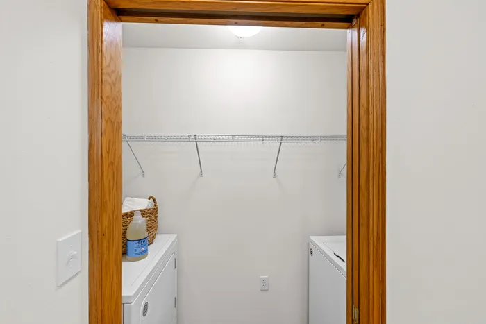 Full size washer and dryer at Saddlebrook Apartments in Pewaukee, Wisconsin.