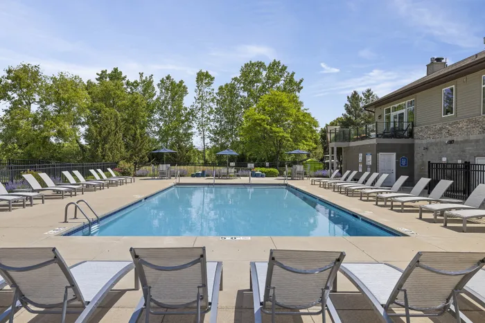 Heated outdoor pool at Saddlebrook Apartments in Pewaukee, Wisconsin.