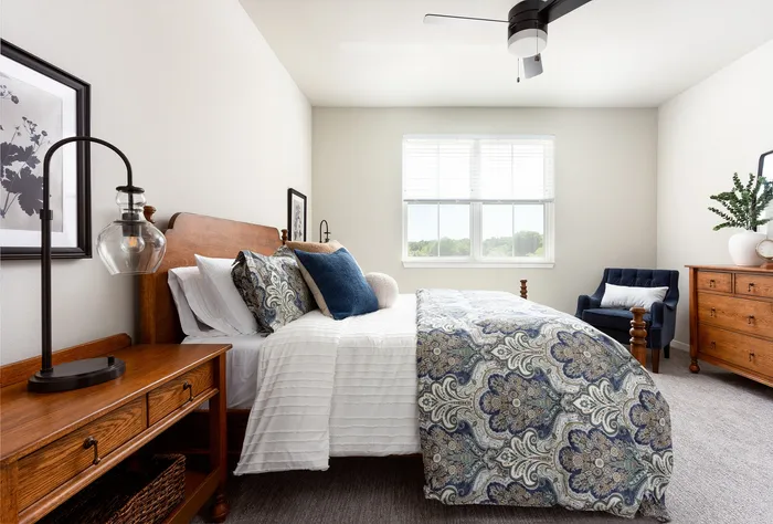 Bedroom in a Terrapin Run stacked flat home.
