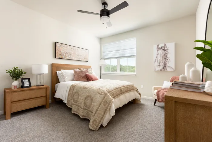 Bedroom in a Terrapin Run stacked flat home.
