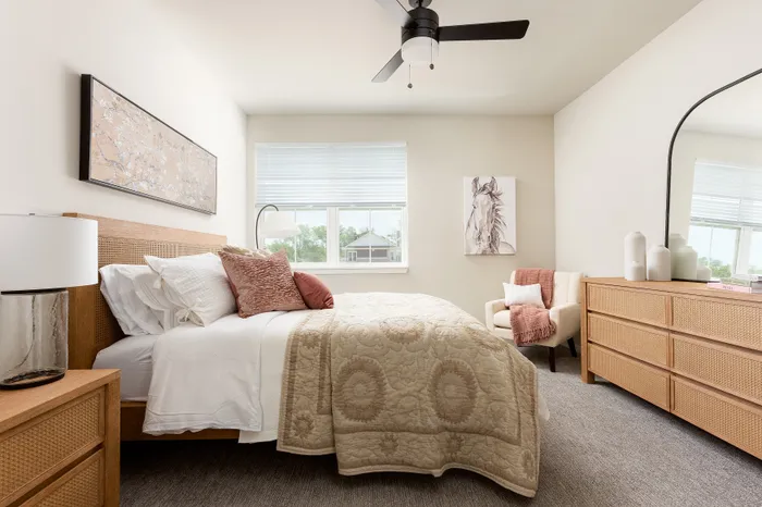 Bedroom in a Terrapin Run stacked flat home.