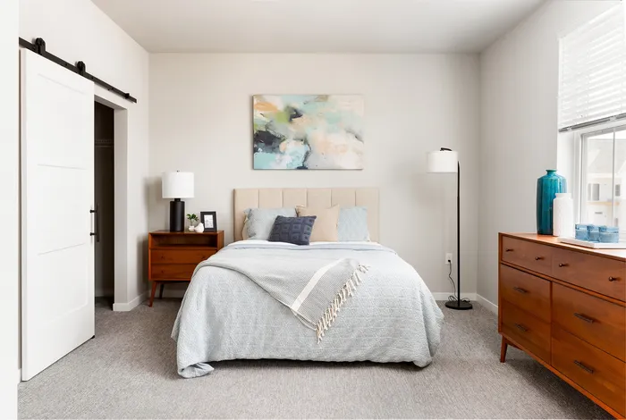Bedroom in a Terrapin Run stacked flat home.