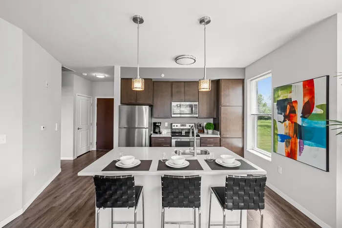 Modern kitchen with contemporary finishes at 22 Slate Apartments in Madison, Wisconsin.