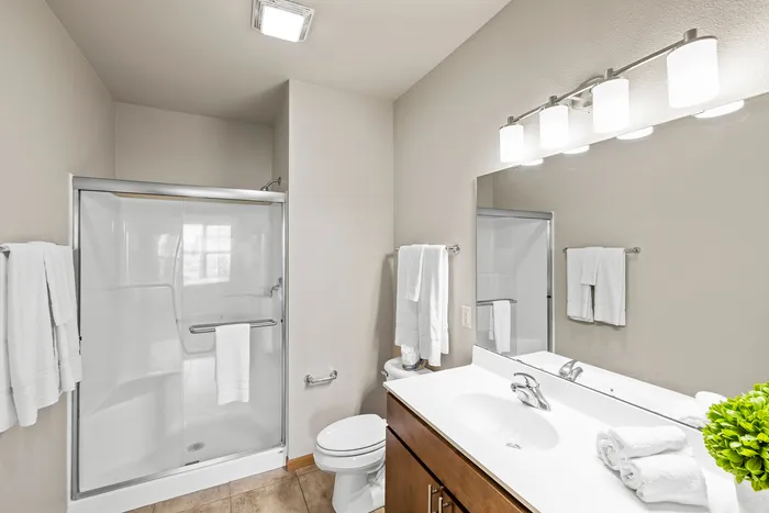 Modern bathroom with upscale finishes at 50Twenty Apartments in Madison, Wisconsin.