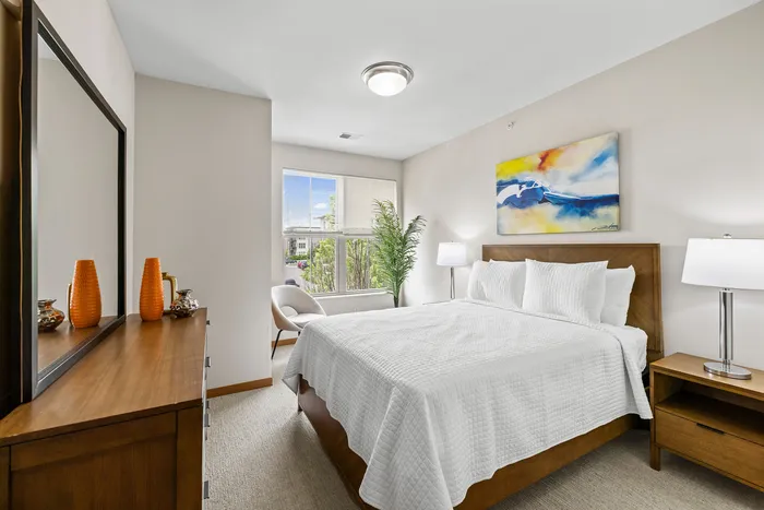 Carpeted modern bedroom at 50Twenty Apartments in Madison, Wisconsin.