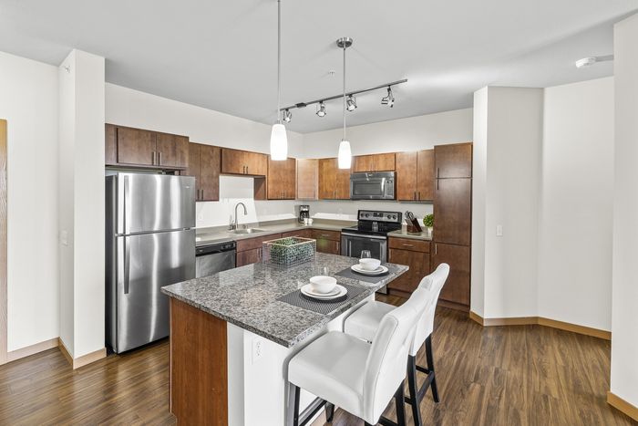 Modern kitchen with contemporary finishes at 50Twenty Apartments in Madison, Wisconsin.