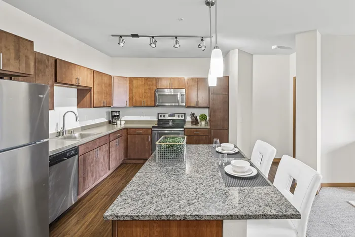 Modern kitchen with contemporary finishes at 50Twenty Apartments in Madison, Wisconsin.