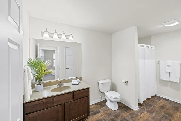 Updated bathroom at Barrington Place Apartments in Madison, Wisconsin with clean finishes and functional layout.