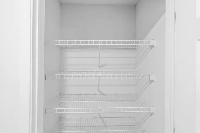 Spacious walk-in closet at Barrington Place Apartments in Madison, Wisconsin.